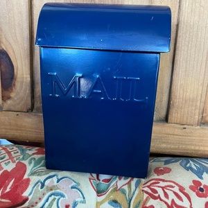 Small blue metal mailbox
